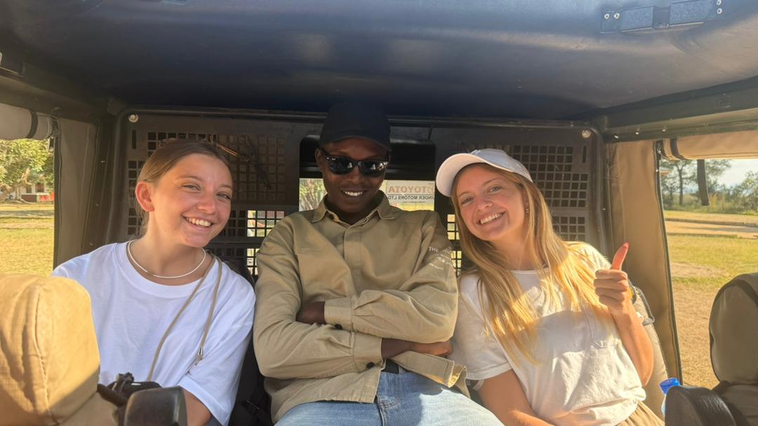 Guide and guests on safari